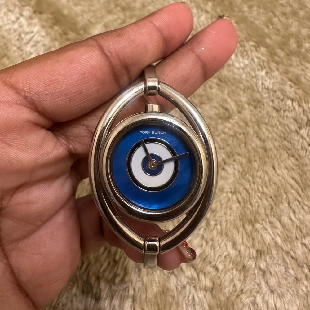 Silver tone Tory Burch evil eye bangle watch